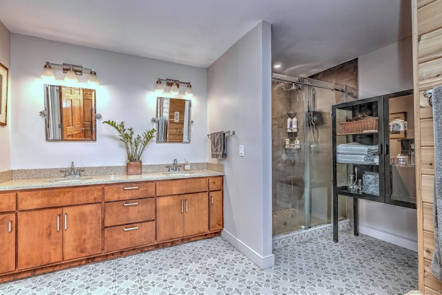 bathroom featuring vanity and an enclosed shower