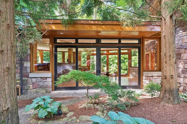 22 Father Peters Ln, New Canaan, CT 06840 - doorway to property with stone siding