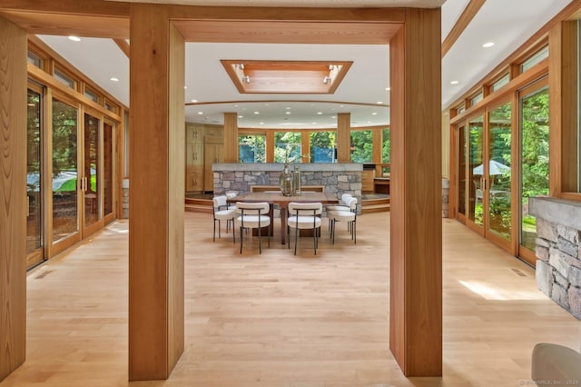 interior space featuring plenty of natural light and light hardwood / wood-style floors