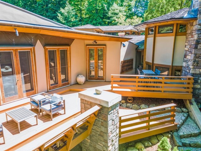 22 Father Peters Ln, New Canaan, CT 06840 - rear view of property featuring french doors and stucco siding