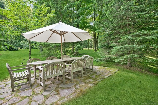 22 Father Peters Ln, New Canaan, CT 06840 - view of green lawn featuring outdoor dining area and a patio area