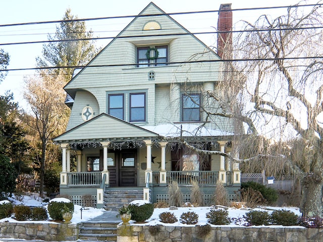 victorian-style house with covered porch