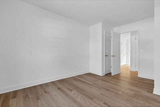 unfurnished bedroom with light hardwood / wood-style flooring