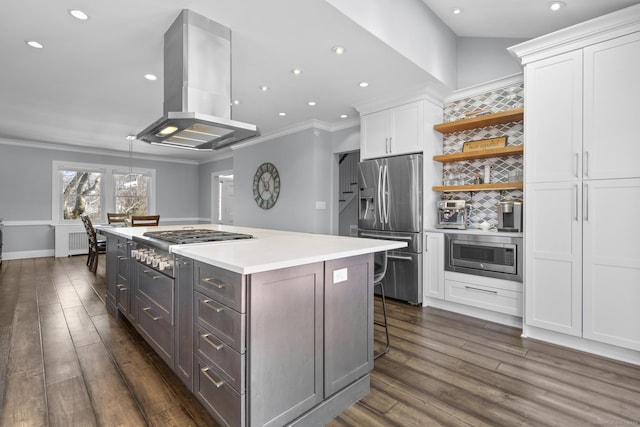 kitchen featuring island range hood, white cabinets, appliances with stainless steel finishes, light countertops, and open shelves