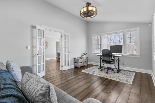 office space featuring lofted ceiling, french doors, dark wood-style floors, and baseboards