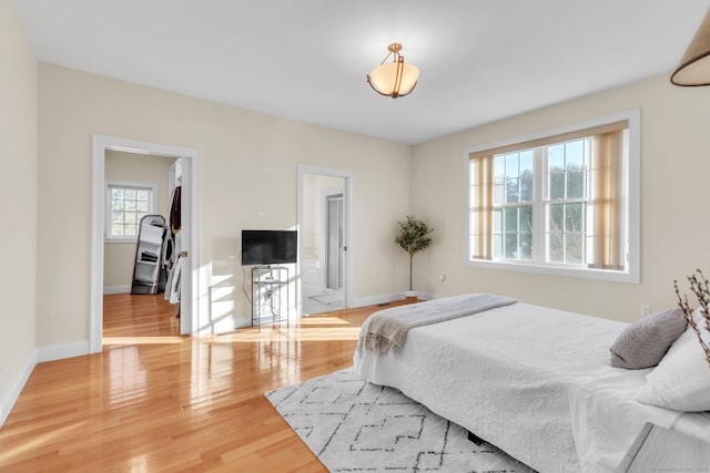 bedroom with wood-type flooring