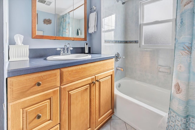 bathroom featuring tile patterned floors, shower / bathtub combination with curtain, and vanity