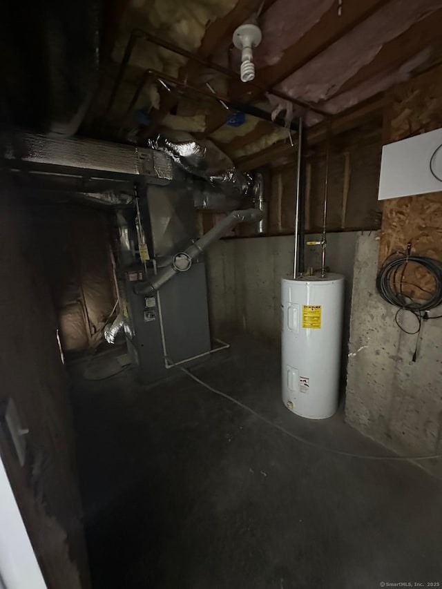 utility room featuring electric water heater