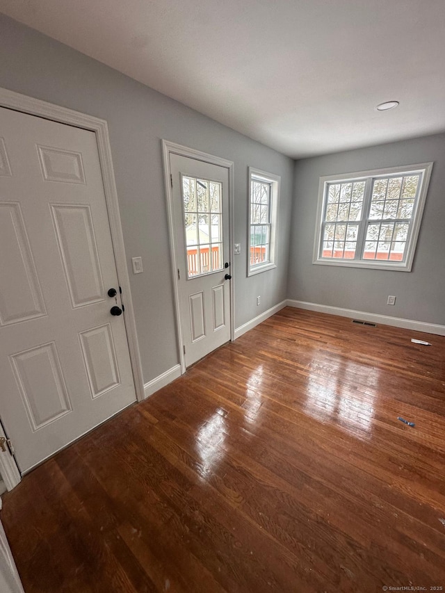 entrance foyer featuring hardwood / wood-style floors