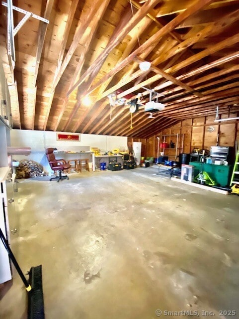 garage featuring a garage door opener