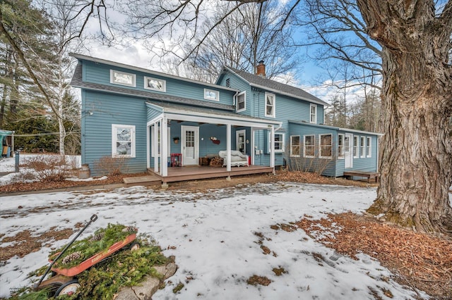 view of snow covered property