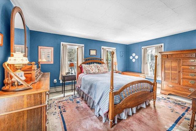 bedroom with a baseboard radiator