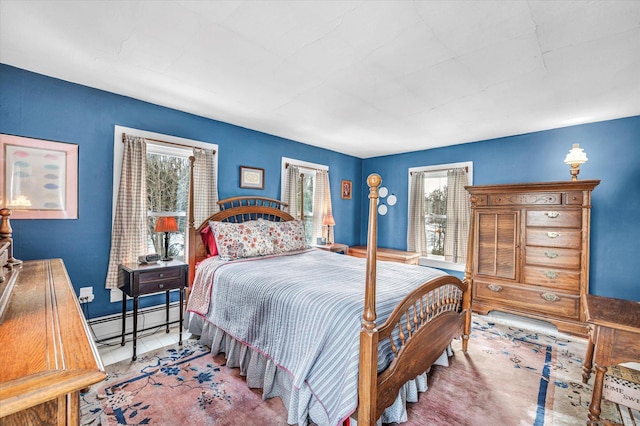 bedroom featuring a baseboard radiator