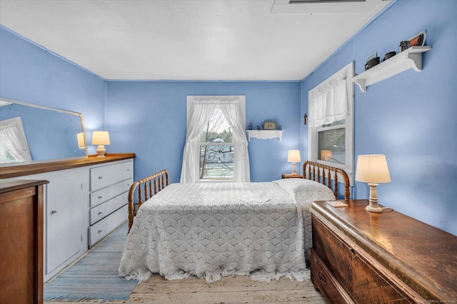 bedroom featuring light hardwood / wood-style flooring