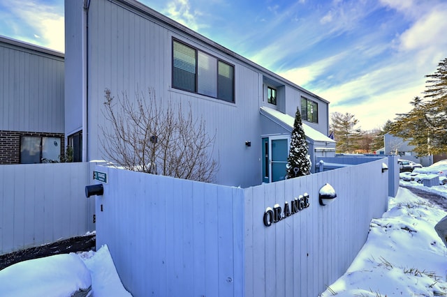 view of snow covered property