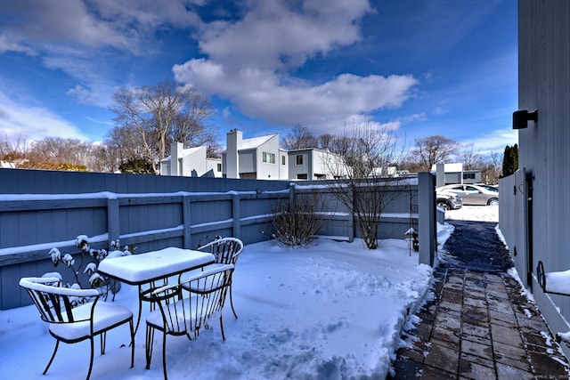 view of snow covered patio