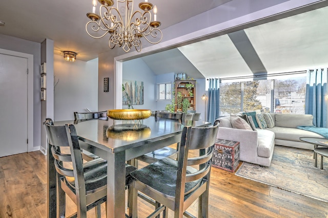 dining area with hardwood / wood-style floors