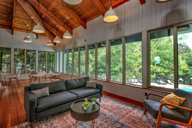 sunroom / solarium with wood ceiling and lofted ceiling with beams