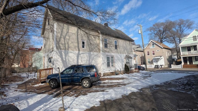 view of snow covered property