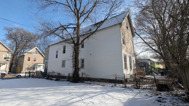 view of snow covered property