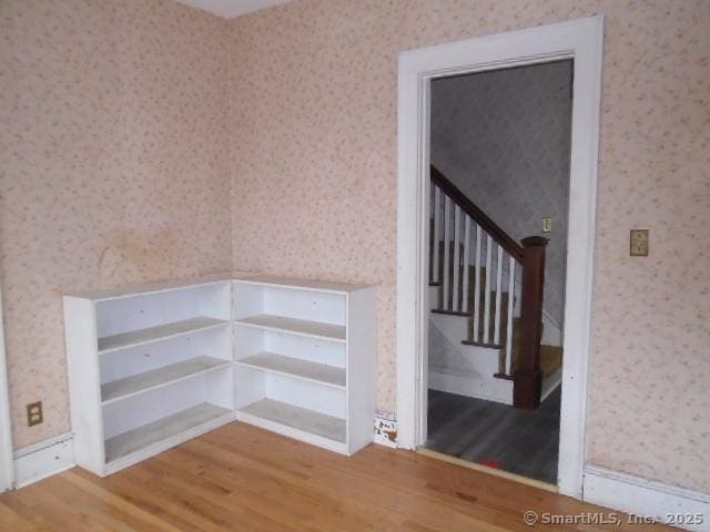 interior space with hardwood / wood-style flooring