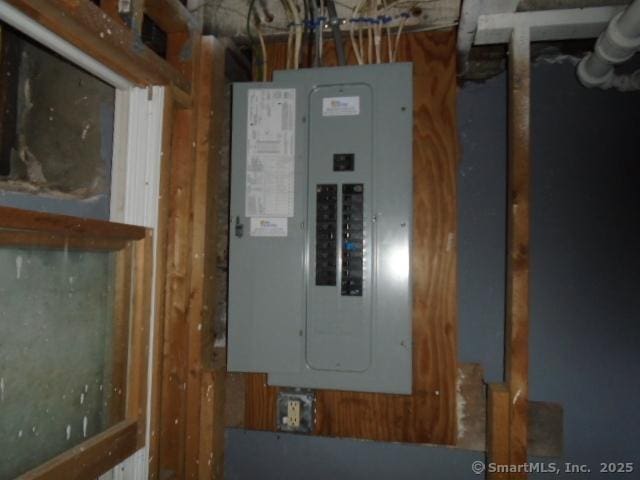 utility room featuring electric panel