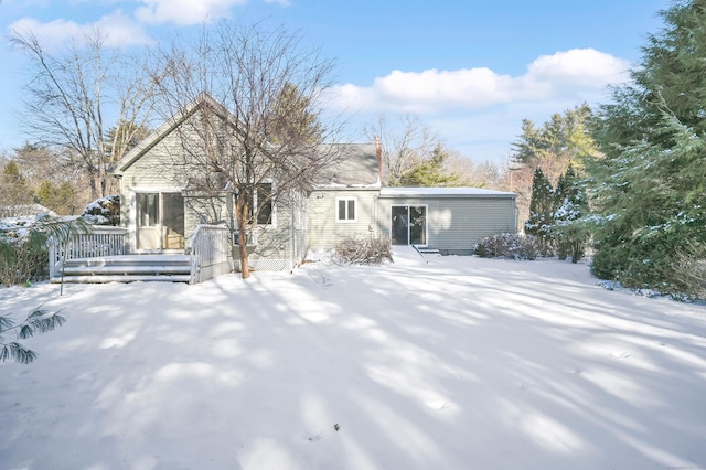 view of snow covered house