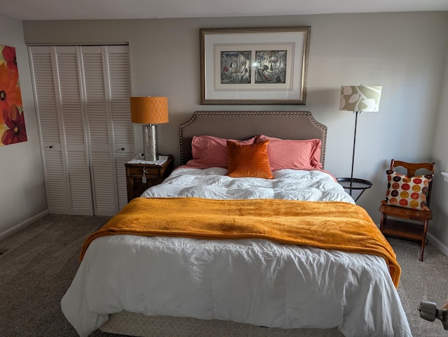 carpeted bedroom featuring a closet