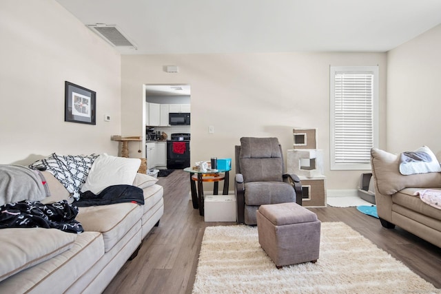 living room featuring hardwood / wood-style flooring