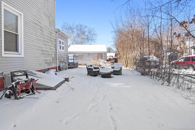 view of yard covered in snow