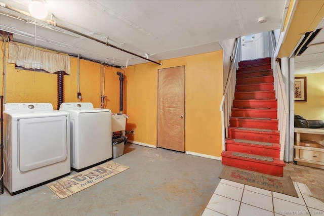 basement featuring washer and clothes dryer