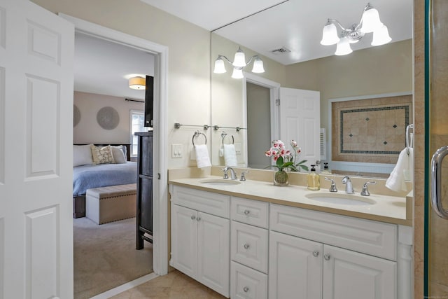 bathroom featuring tile patterned floors and vanity