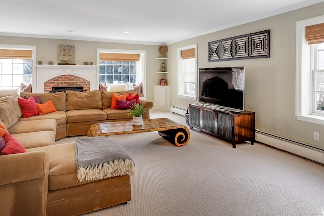 carpeted living room with crown molding, plenty of natural light, a baseboard heating unit, and a fireplace