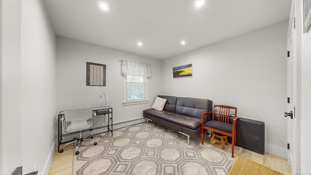 office area featuring light hardwood / wood-style flooring and a baseboard radiator