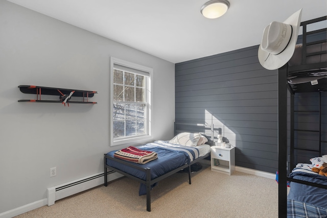 bedroom featuring carpet and a baseboard radiator