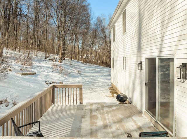 view of snow covered deck