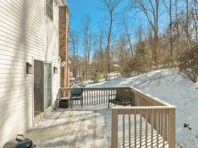 view of snow covered deck