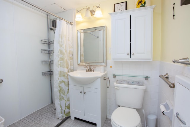 bathroom featuring tile walls, vanity, toilet, tile patterned floors, and a shower with shower curtain