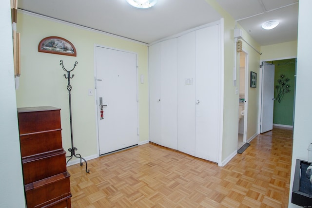 foyer with light parquet flooring