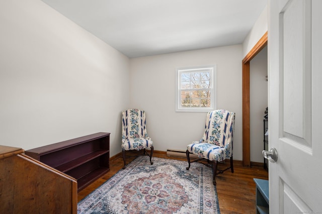 sitting room with dark hardwood / wood-style flooring