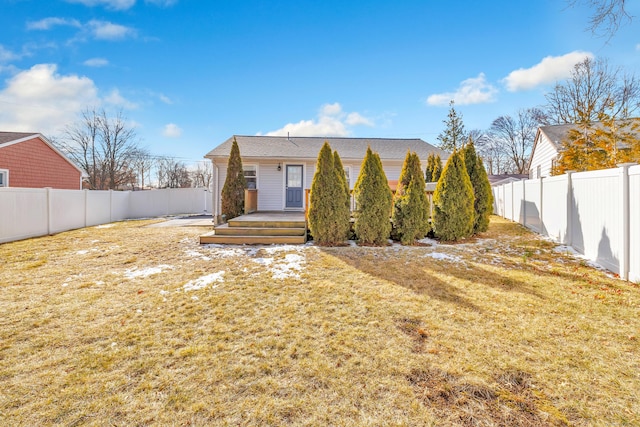 63 Contact Dr, West Haven, CT 06516 - rear view of house featuring a lawn, a deck, and a fenced backyard