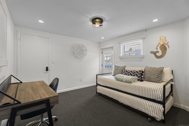 bedroom with dark carpet