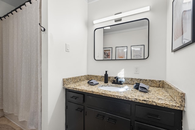 bathroom with vanity and a shower with shower curtain