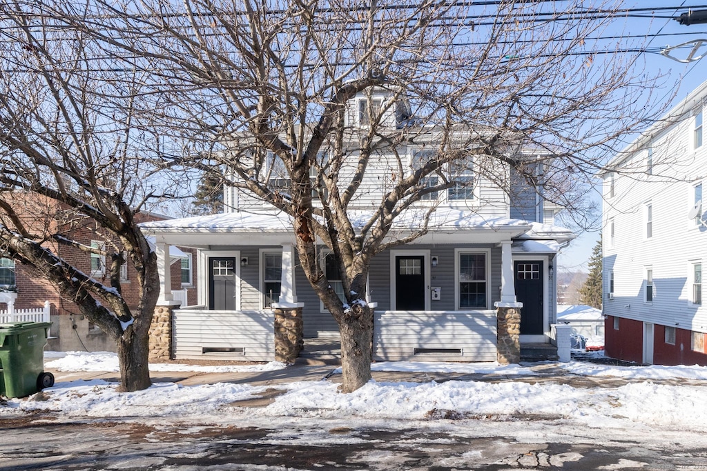 view of front of property featuring covered porch