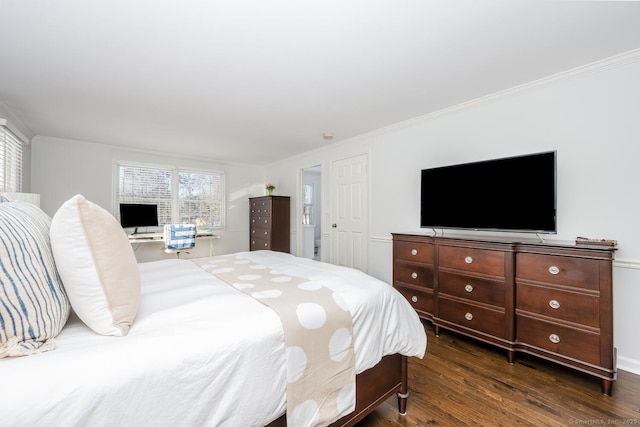 bedroom with dark wood-type flooring and crown molding