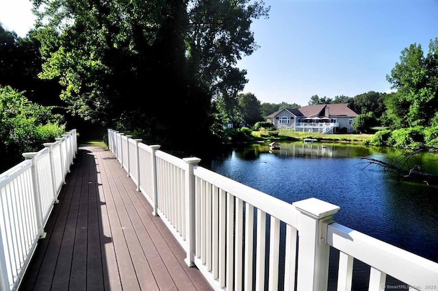 deck featuring a water view