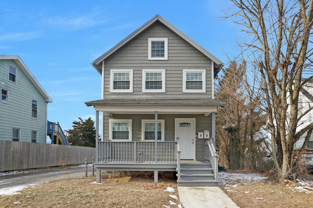 view of front property featuring a porch