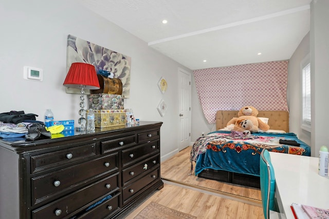 bedroom with light hardwood / wood-style floors