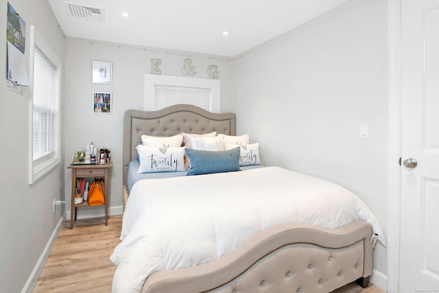 bedroom featuring light hardwood / wood-style floors