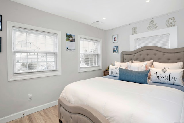 bedroom with light wood-type flooring